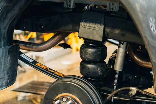 BALLESTAS PARABOLICAS ARB 40 mm + PULMONES DE AIRE TOYOTA HILUX 2015+